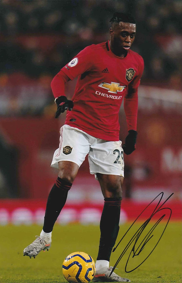 AARON WAN BISSAKA SIGNED MANCHESTER UNITED 12X8 PHOTOGRAPH (AFTAL COA)
