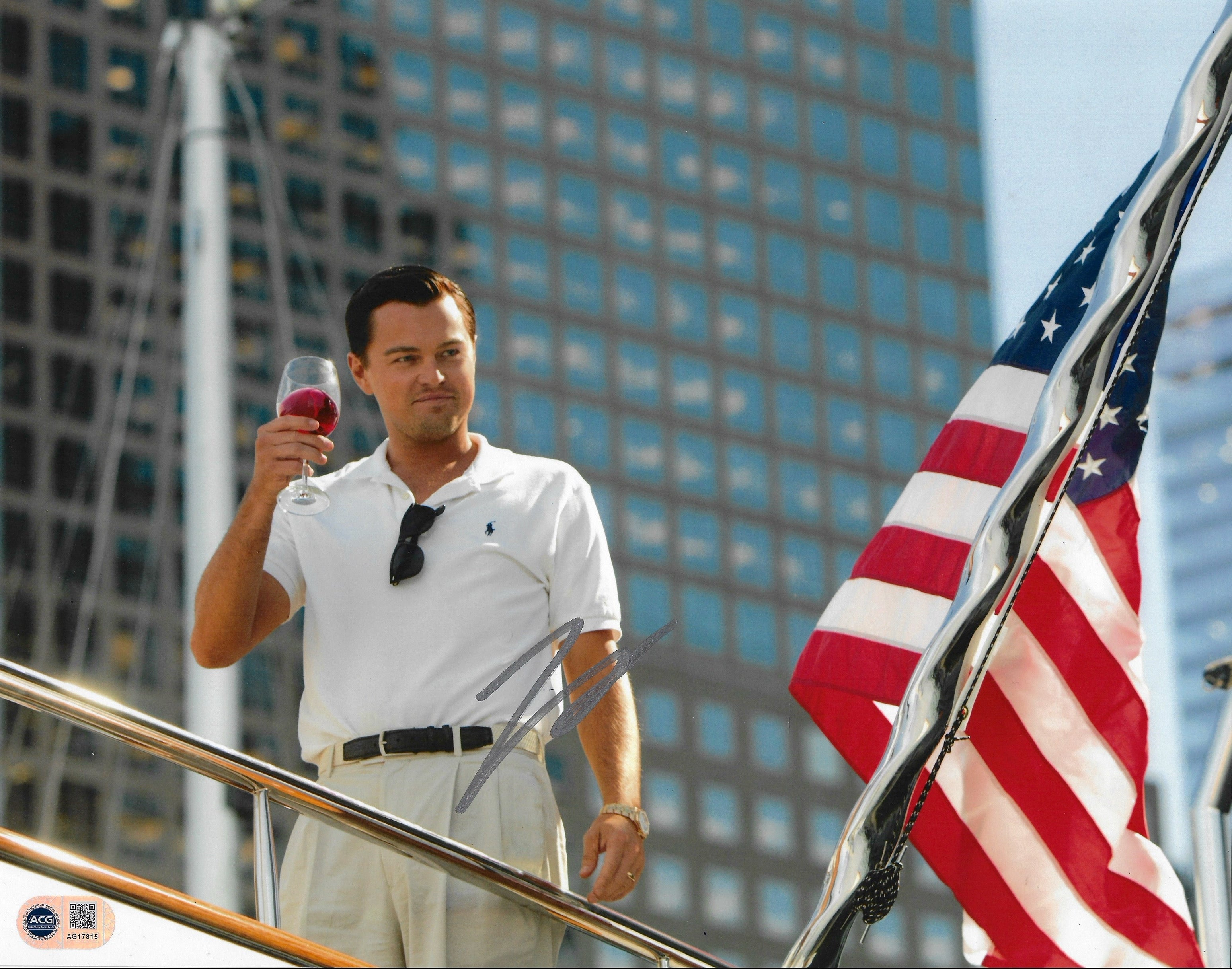 LEONARDO DI CAPRIO SIGNED WOLF OF WALL STREET 14x11 PHOTO (ACG CERT AG17815)