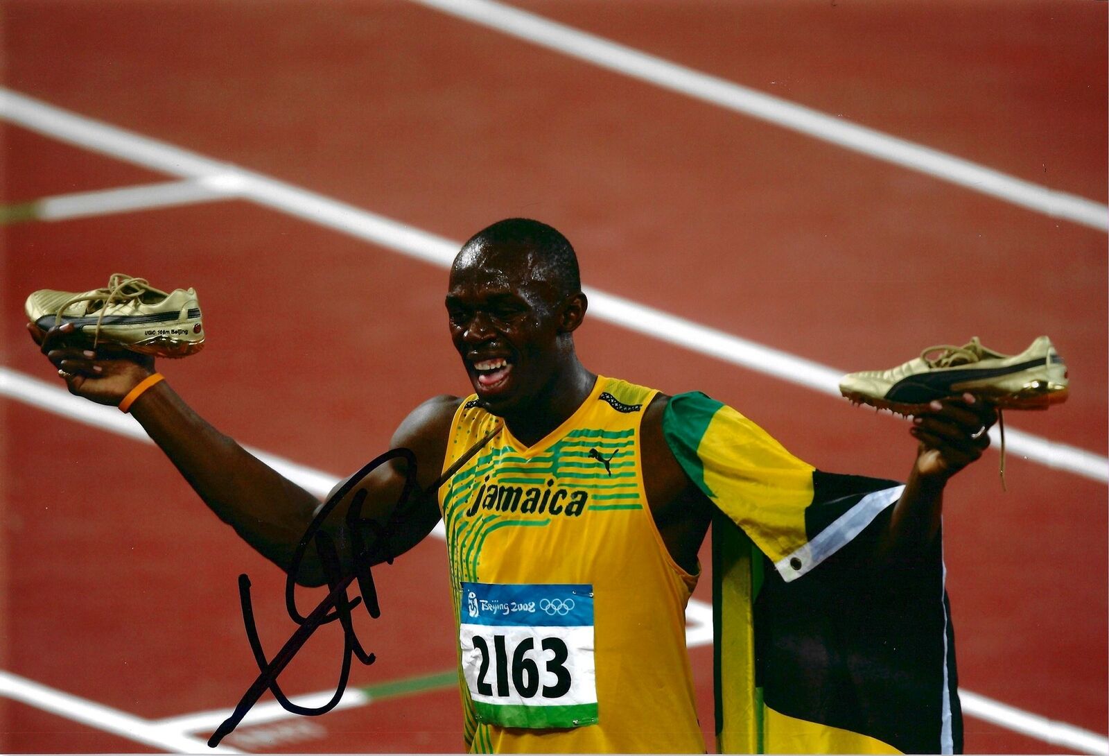 USAIN BOLT SIGNED 12x8 OLYMPICS JAMAICA PHOTOGRAPH 9 (AFTAL COA)