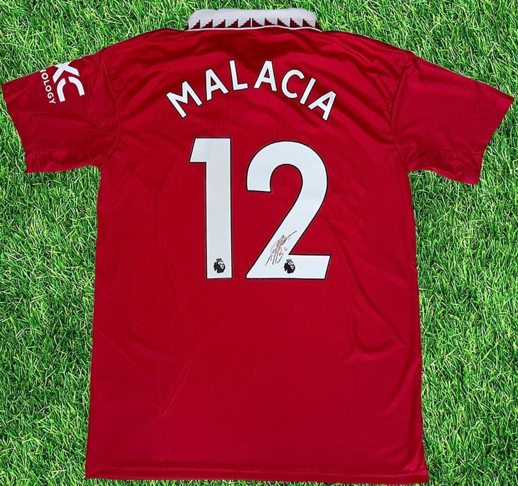 TYRELL MALACIA SIGNED 2022/23 MANCHESTER UTD HOME SHIRT 2 (AFTAL COA)