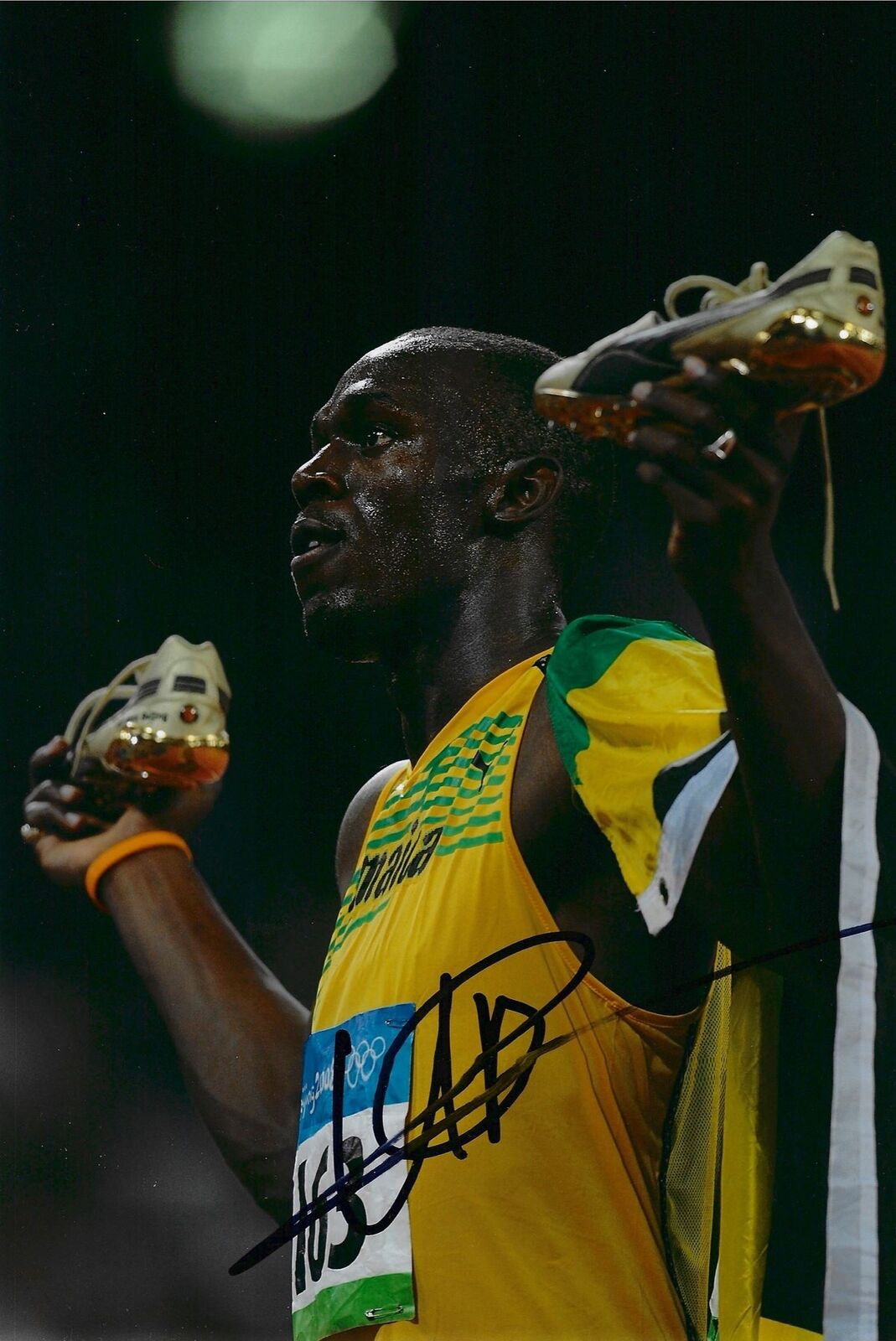 USAIN BOLT SIGNED 12x8 OLYMPICS JAMAICA GOLDEN BOOT PHOTOGRAPH 2 (AFTAL COA)
