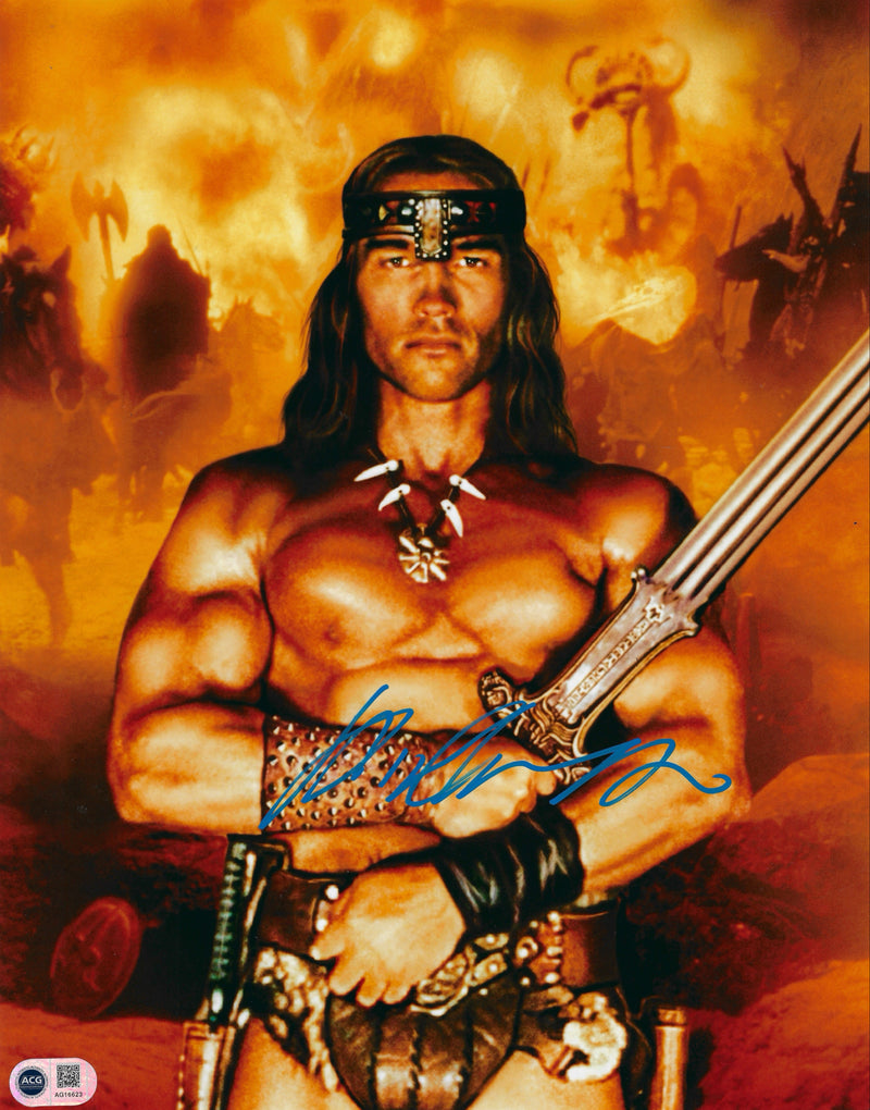 ARNOLD SCHWARZENEGGER SIGNED CONAN 14x11 PHOTO (ACG CERT AG16623)-1