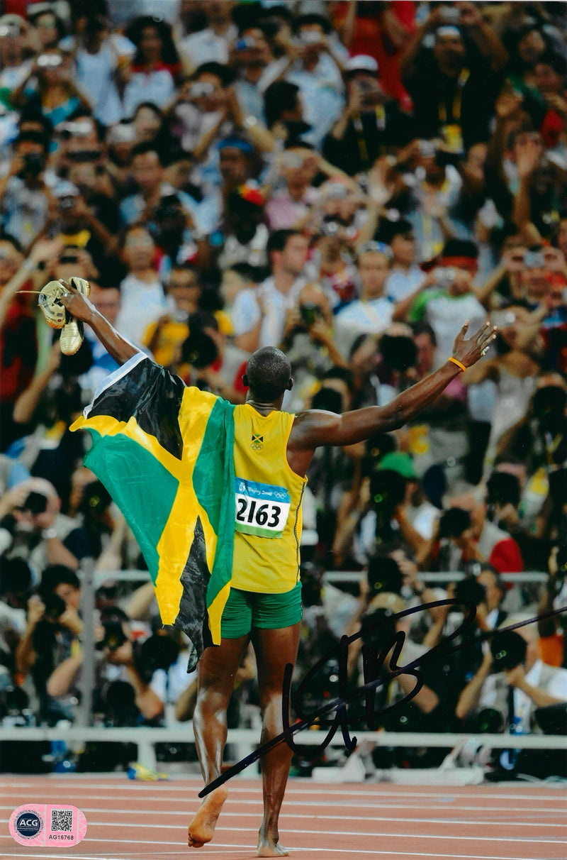 USAIN BOLT SIGNED 12x8 OLYMPICS LEGEND JAMAICA PHOTO (ACG CERT AG16768)-1