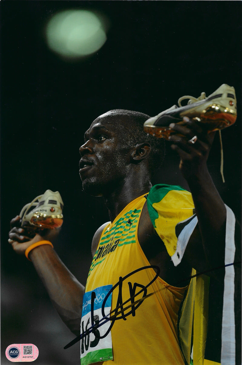 USAIN BOLT SIGNED 12x8 OLYMPICS LEGEND JAMAICA 9.58 PHOTO (ACG CERT AG16767)-1