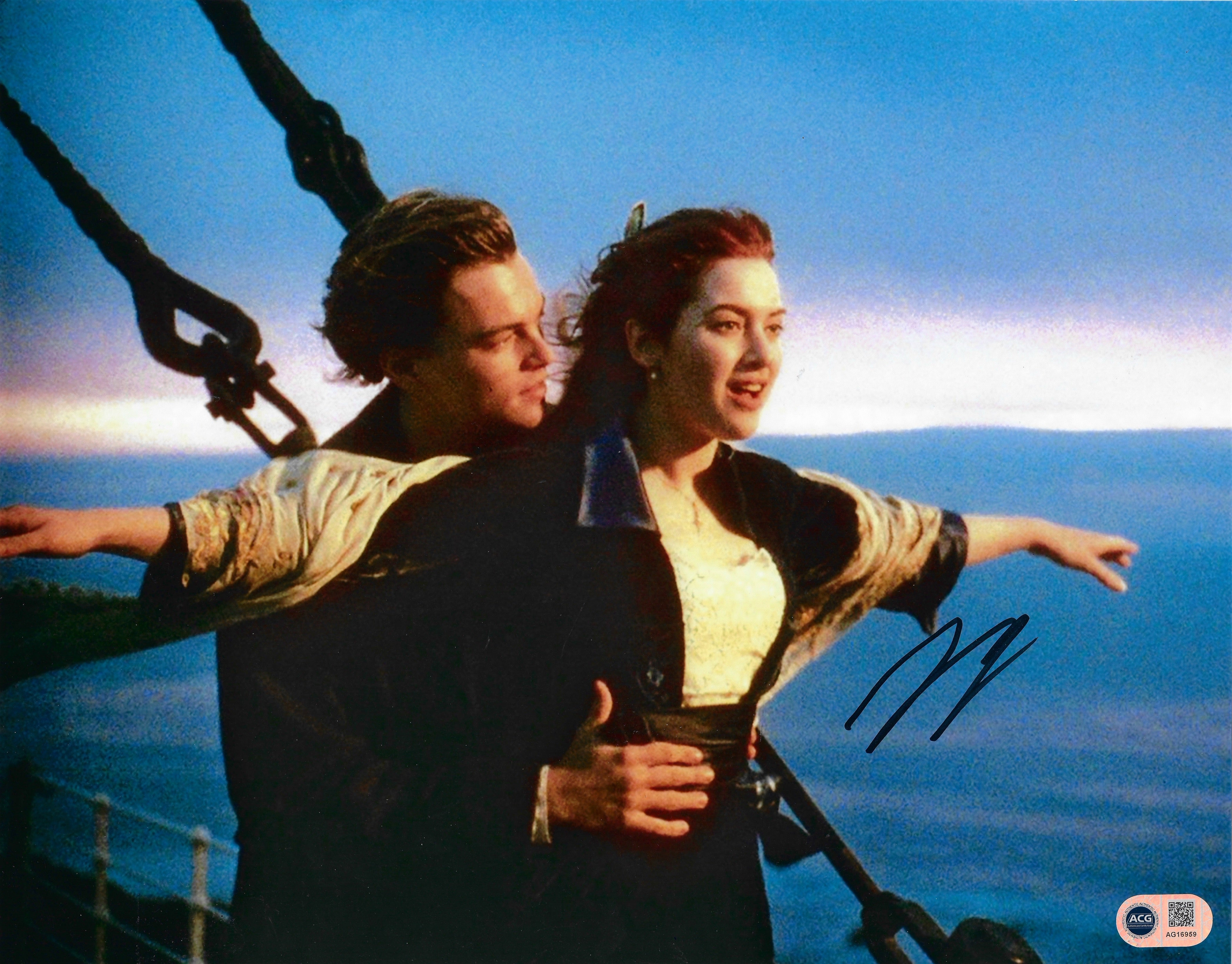 LEONARDO DI CAPRIO SIGNED TITANIC 14x11 PHOTO (ACG CERT AG16959)